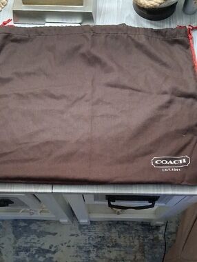 Coach Dust Cover $17 Each